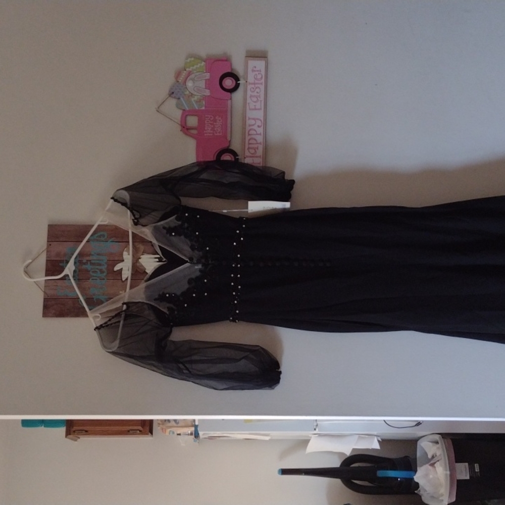 A TS couture wedding gown black embellished with rhinestones and black sequins